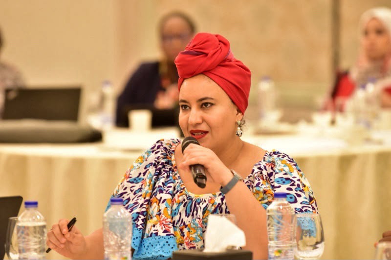 Maha Jouini speaking at a conference